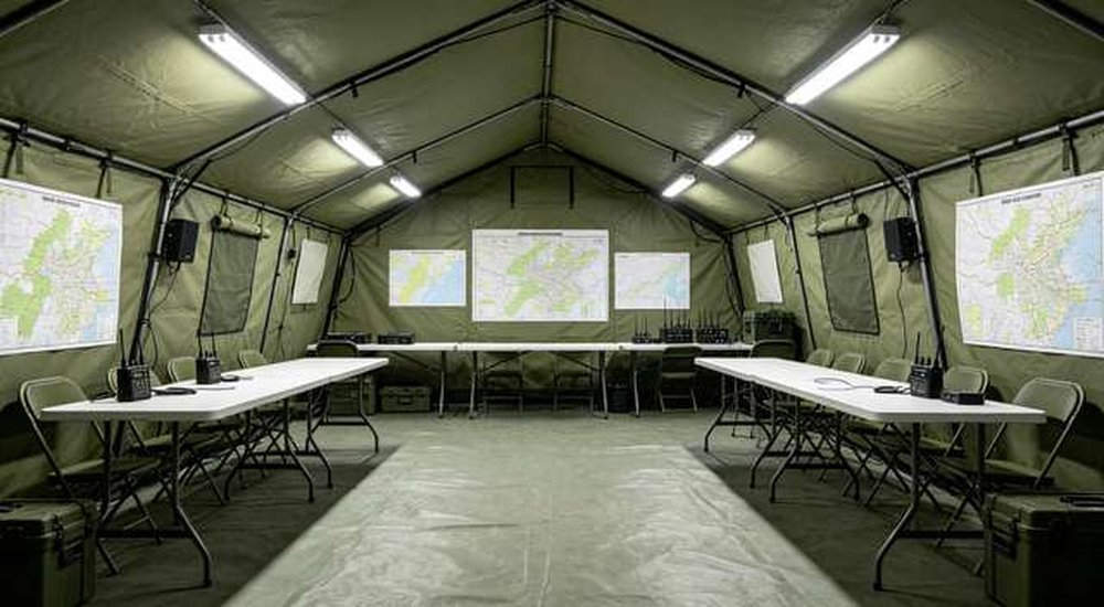 Interior of large emergency command tent with maps and communication equipment, no people, custom OEM field command center, professional product photography