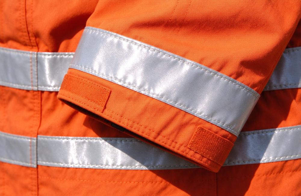 Flat-lay view of rescue suit quick dry test showing moisture wicking for technical orange rescue clothing fast dry performance and rescue clothing all day comfort