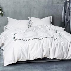 Draps-housses brodés One Direction pour hôtel