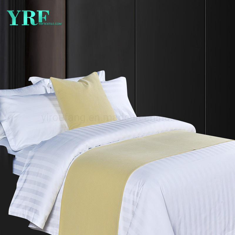 Où trouvez-vous les housses de couette et les draps blancs dans l'hôtel ?